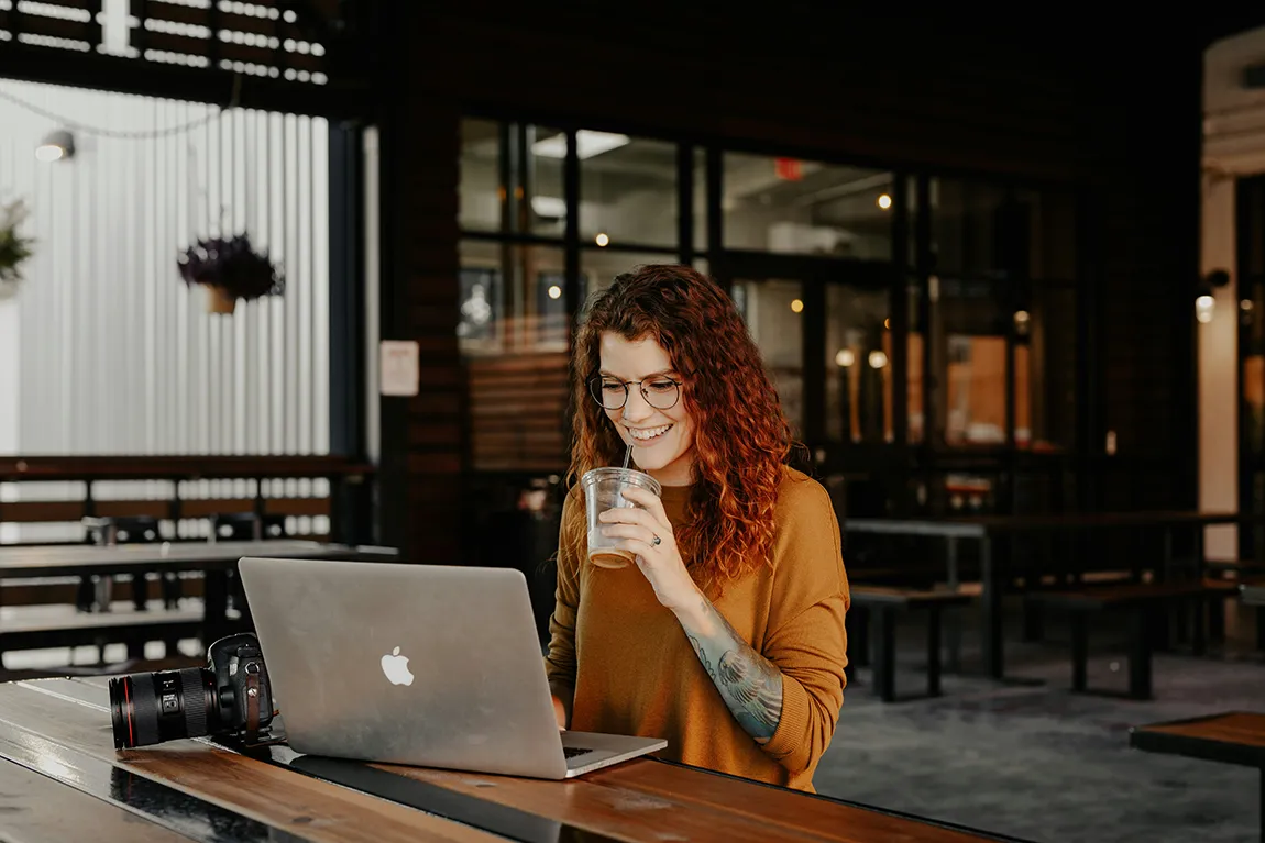 Women working on laptop in agency